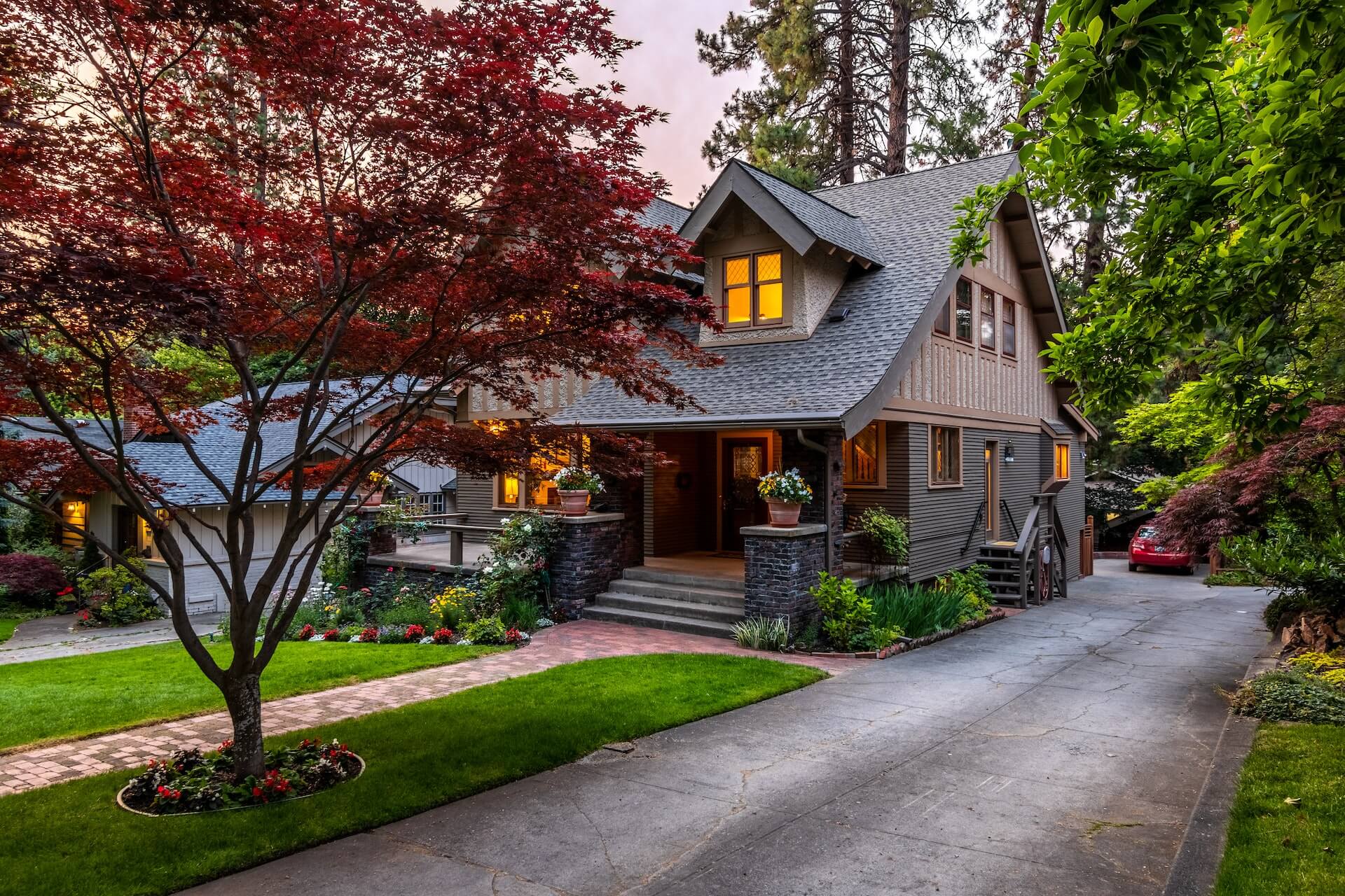 Tree Removal Service Bloomington IN Home surrounded by beautiful trees and landscaping